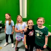 Kids celebrating a birthday party at Arena 5/9 Family Fun Zone
