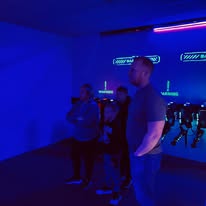 Laser tag players receiving mission instructions at Arena 5/9