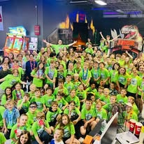 Players battling through the laser tag arena at Arena 5/9